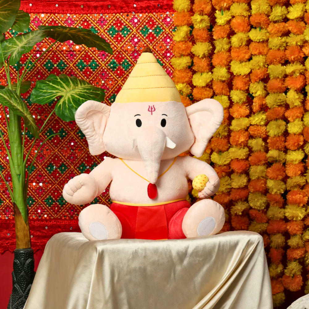 A white Ganesh plushie